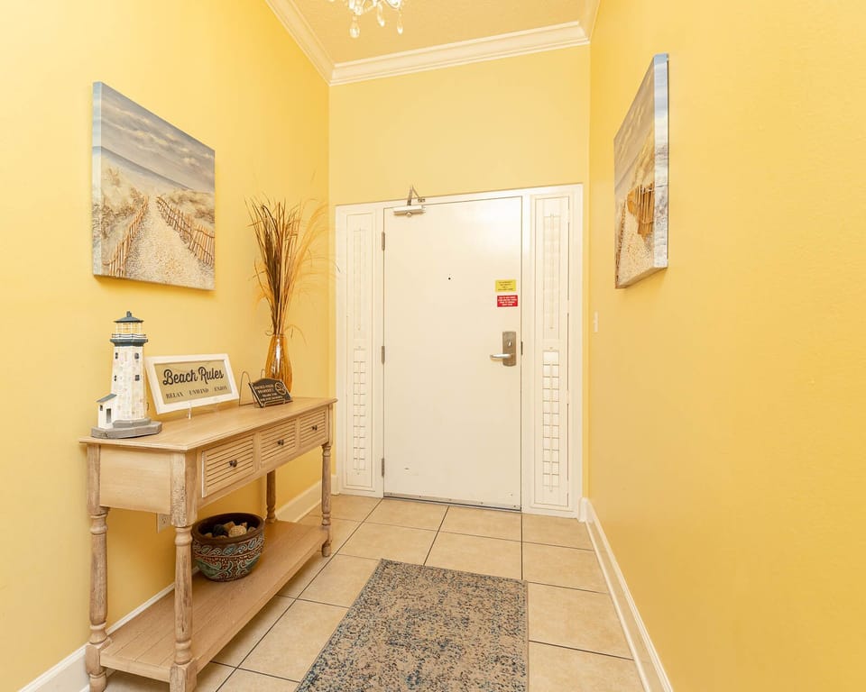 Step inside and feel welcomed by vibrant decor, ready to kick off your beach adventures in this charming entryway