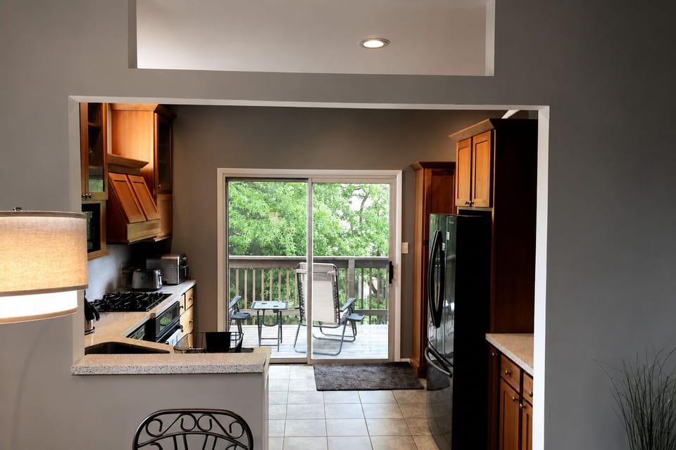 Another view of the kitchen and deck