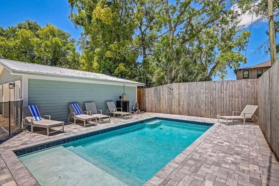 Private, sparkling clean pool with lounges perfect for lazy days by the water