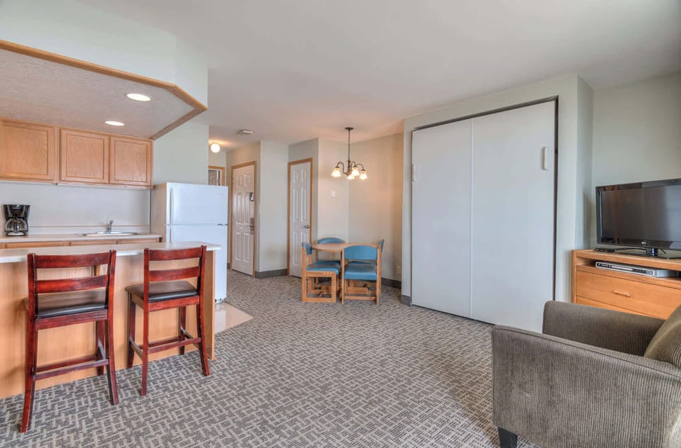 The Murphy bed folds up out of the way during the day