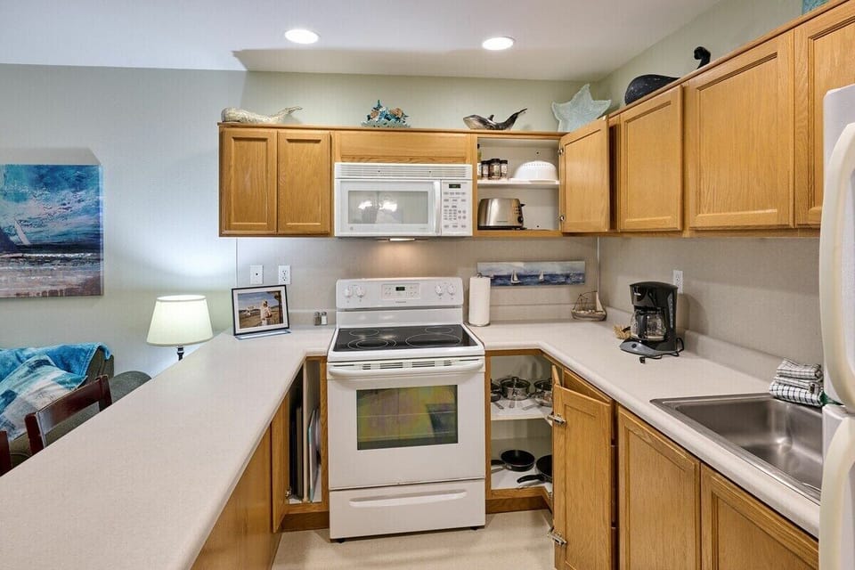 The kitchen comes fully stocked with everything you need to prep meals