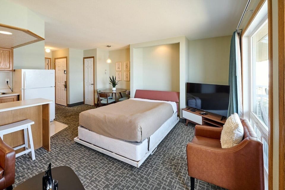 The Murphy Bed folds down during the day for extra sleeping space