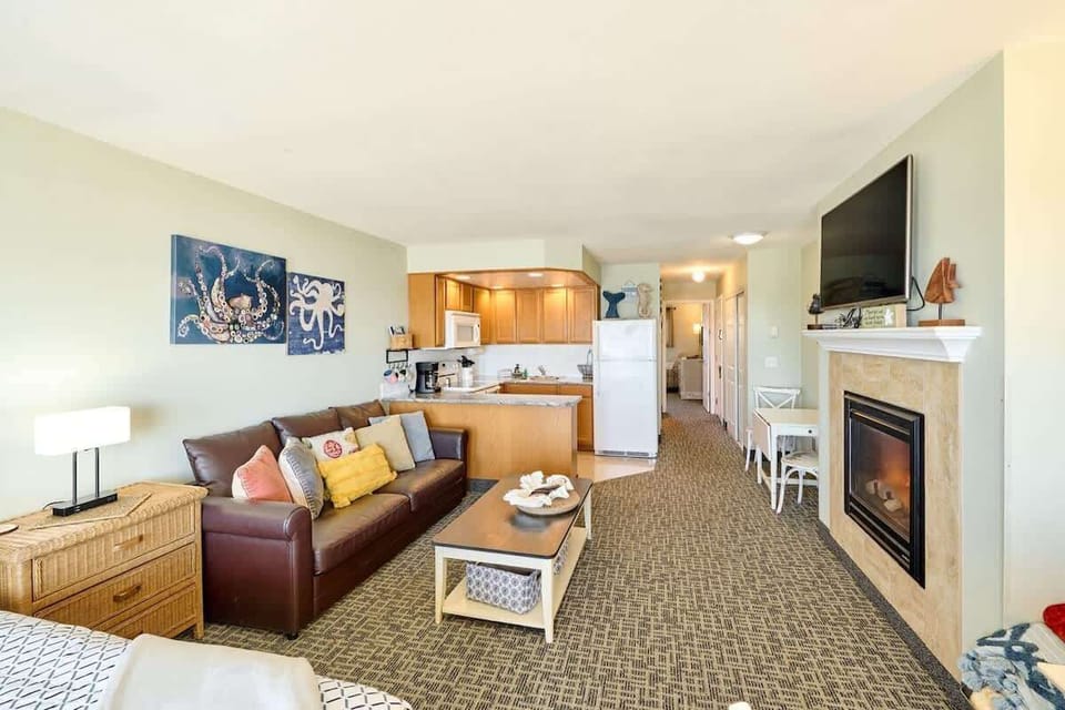 Watch TV or cozy up by the fireplace