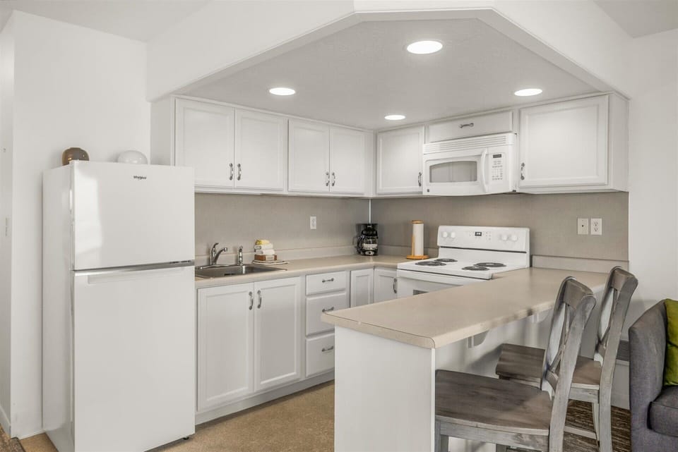 The condo has a full kitchen