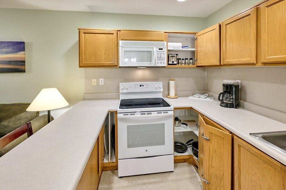 The kitchen comes fully stocked with everything you need to prep meals