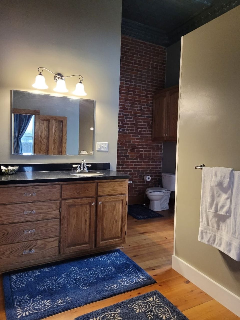 Main Bath with entrance from Bedroom 1 and hallway