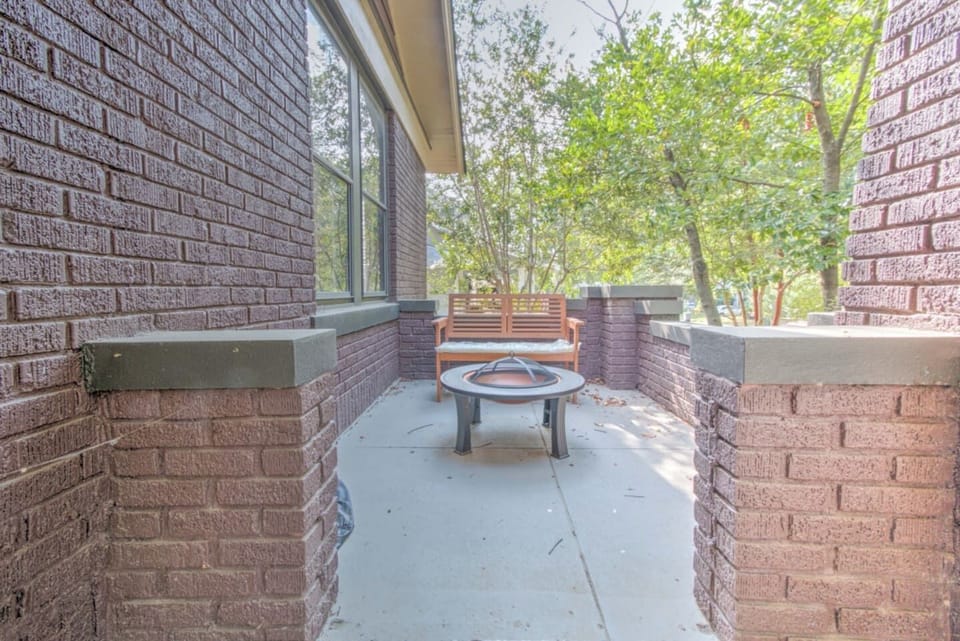 Front patio, you`ll find a bench out here too if you want to sit amongst the trees and take in the sounds of the birds chirping.