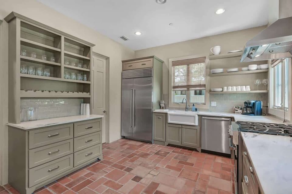 Gourmet kitchen with large butler's pantry behind the closed door.