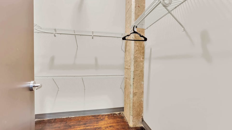 Storage Room: Keep your vacation gear tidy with spacious shelving and plush towels at the ready!