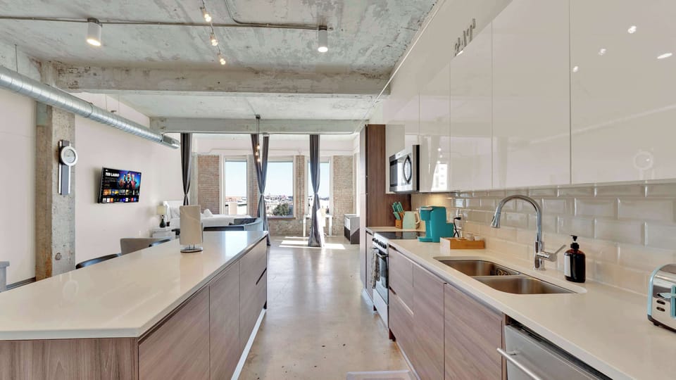 Chic Kitchen & Dining: Enjoy stylish meals with stunning city views and modern decor!