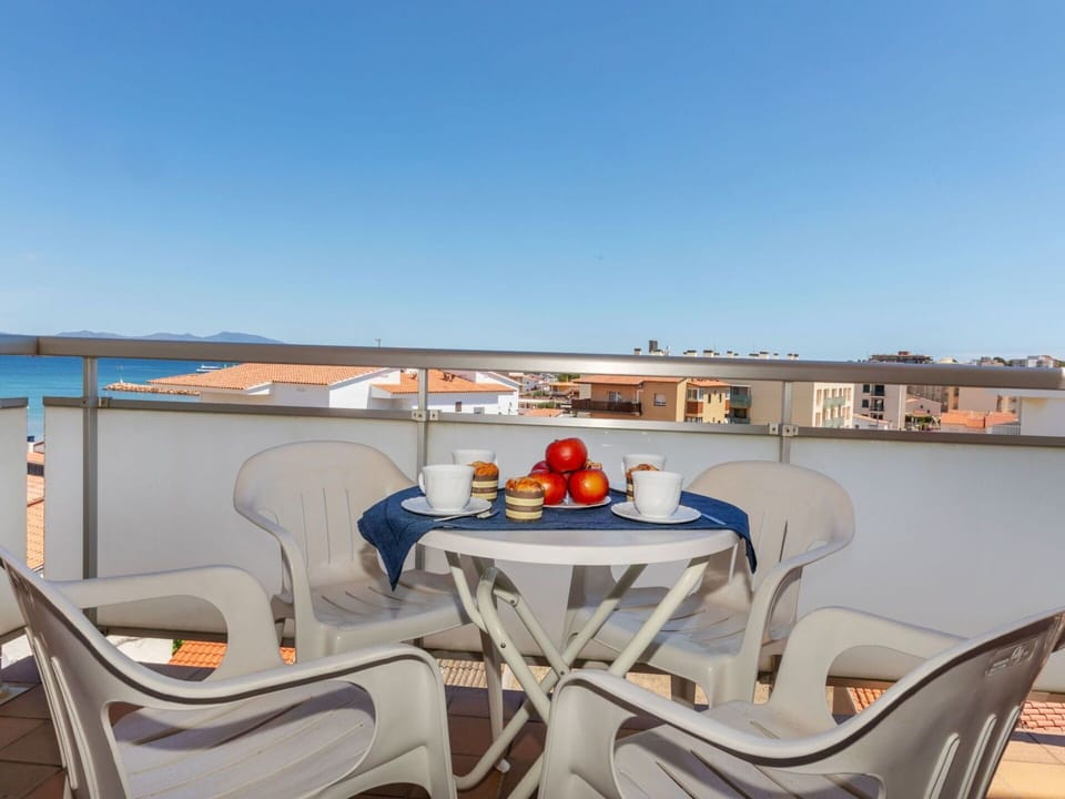 Sky, Table, Furniture, Property, Azure, Chair, Outdoor Table, Outdoor Furniture, Shade, Tableware