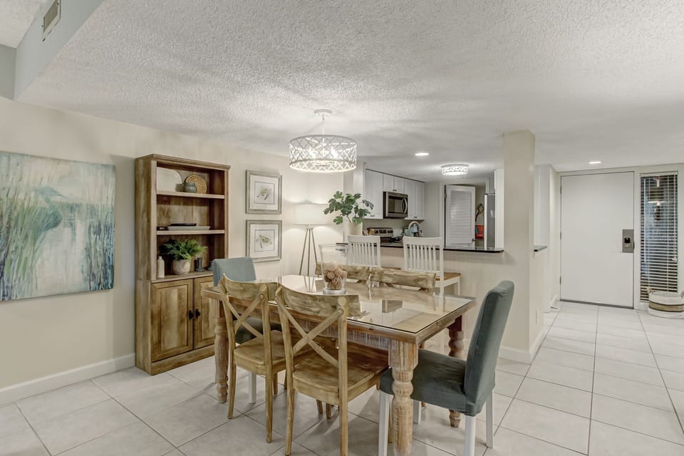 Dining Area with Table Seating for Six and Counter Seating for Two