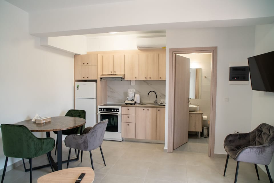 Comfort Apartment | Living area | TV