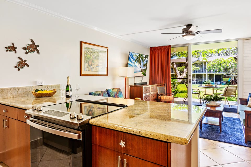 Kitchen features stainless steel appliances and granite countertops