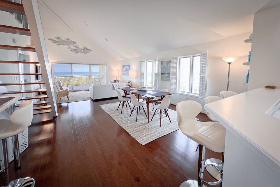 Dining area with seating at kitchen bar