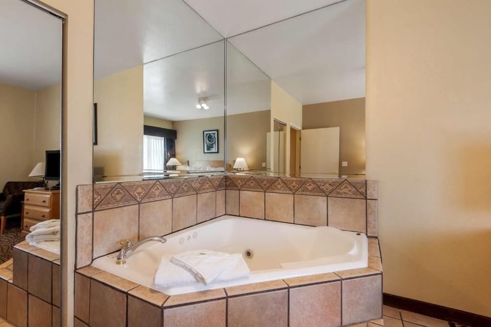 Combined shower/tub, hair dryer, towels, soap