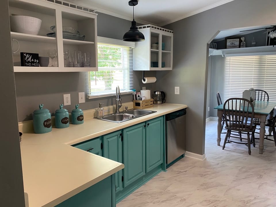 FULLY STOCKED KITCHEN WITH ALL NEW APPLIANCES-DISHWASHER, STOVE, MICROWAVE, FRIG