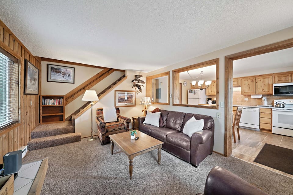 Townhome | Living area | 42-inch flat-screen TV with satellite channels, TV, fireplace