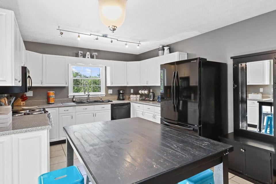 View as you enter the front door into the kitchen and dining area. 