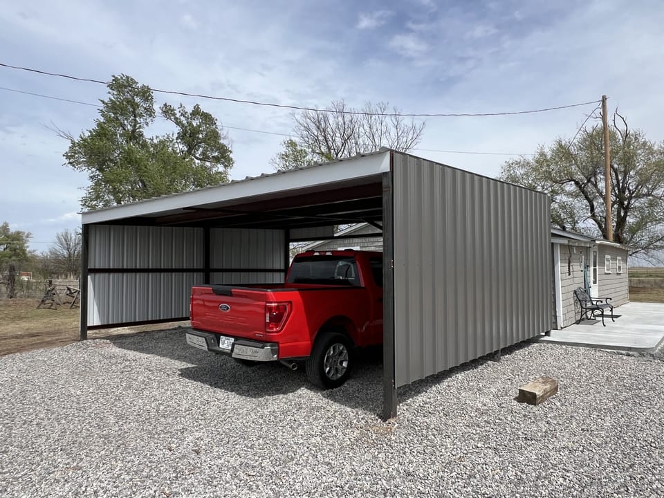 A new carport is available and provides protection for two vehicles.