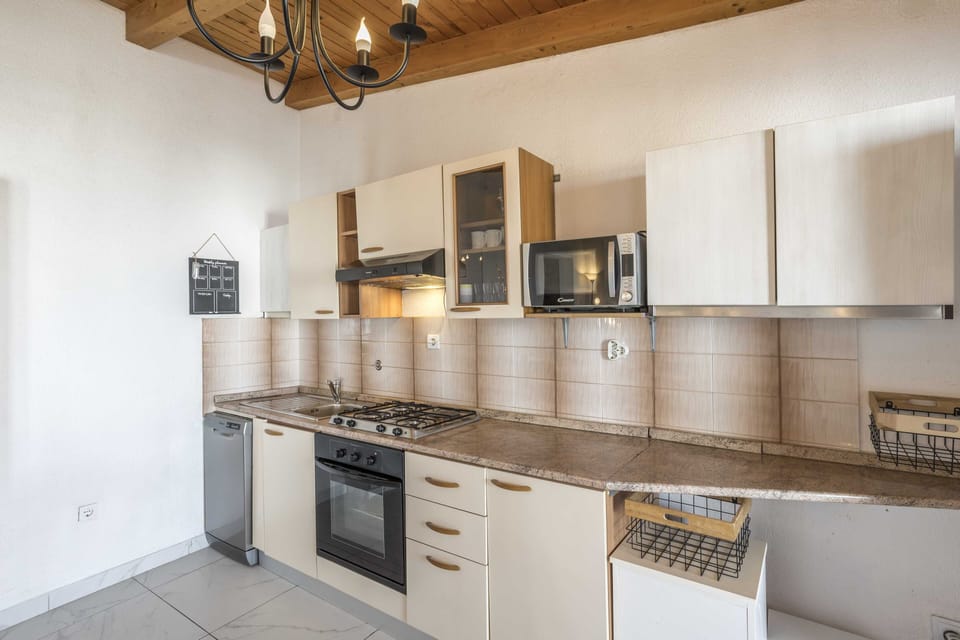 Apartment (Three Bedroom Apartment with Terrace) | Private kitchen | Fridge