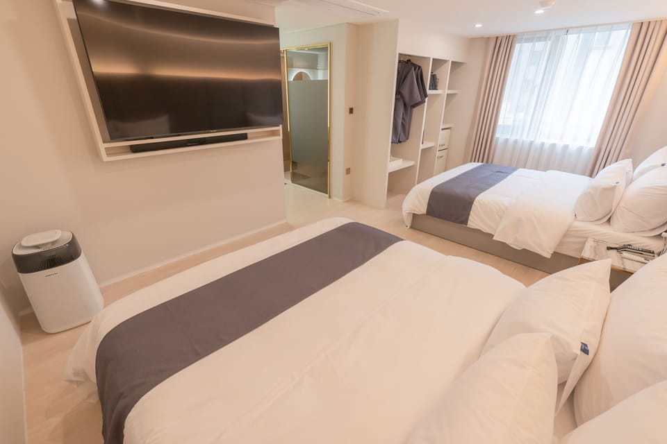Double Twin Room (Breakfast not available on Sundays) | Premium bedding, in-room safe, blackout drapes, soundproofing
