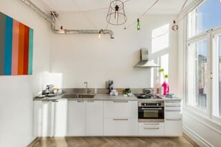 Deluxe Apartment | Private kitchen | Shared fridge, microwave