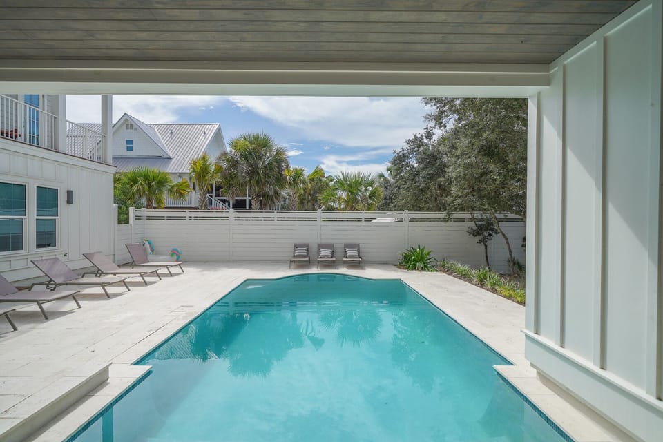 Large private pool with outdoor entertainment area
