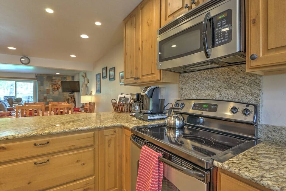 Well-equipped kitchen with drip coffee maker and Keurig machine
