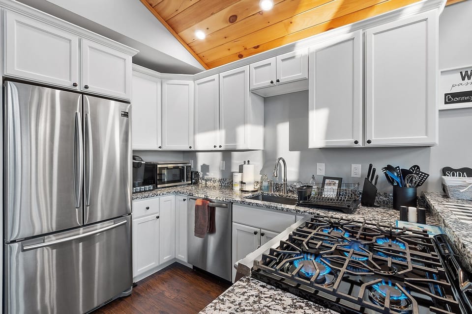 Kitchen area with gas stove, equipped to prepare just about any type of meal.