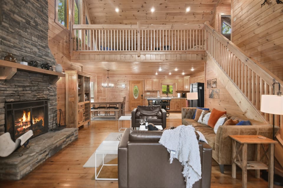 Seamless blend of modern and rustic warmth around the open fireplace