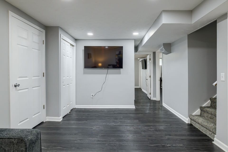 Basement living room with 55inch Roku TV