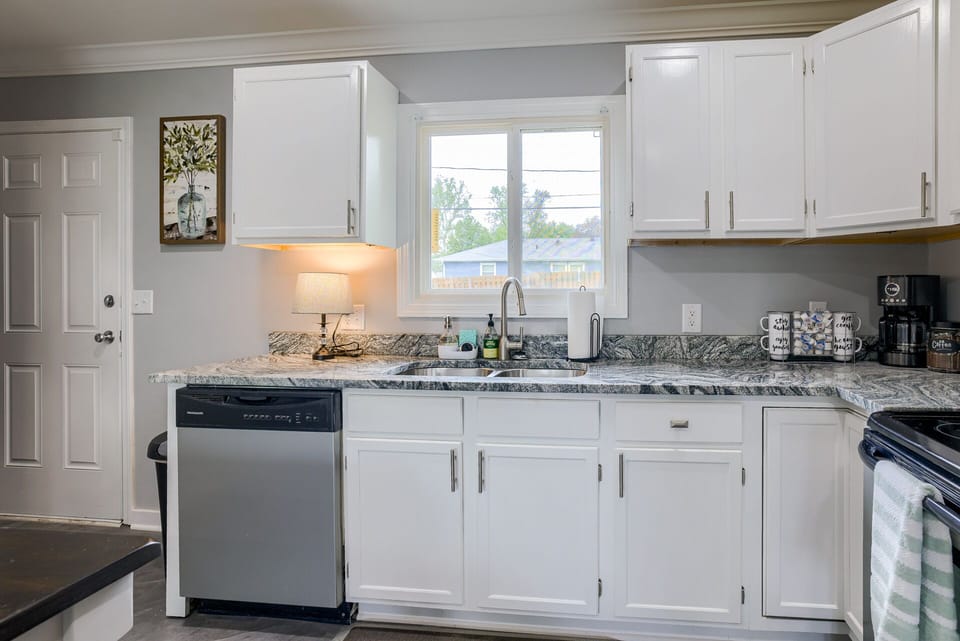 Full kitchen with direct access to a fenced in and well maintained backyard