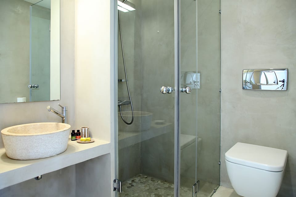 Shower, rainfall showerhead, designer toiletries, hair dryer