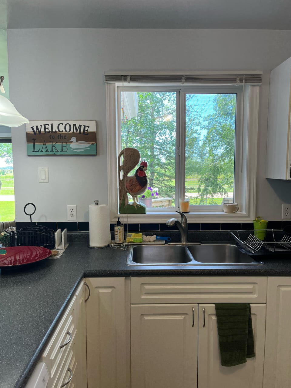 The west facing window  in the kitchen. Welcome to the Lake.