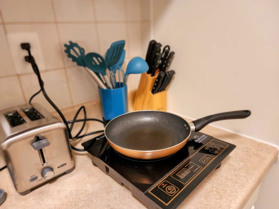 Induction heating element and cookware.