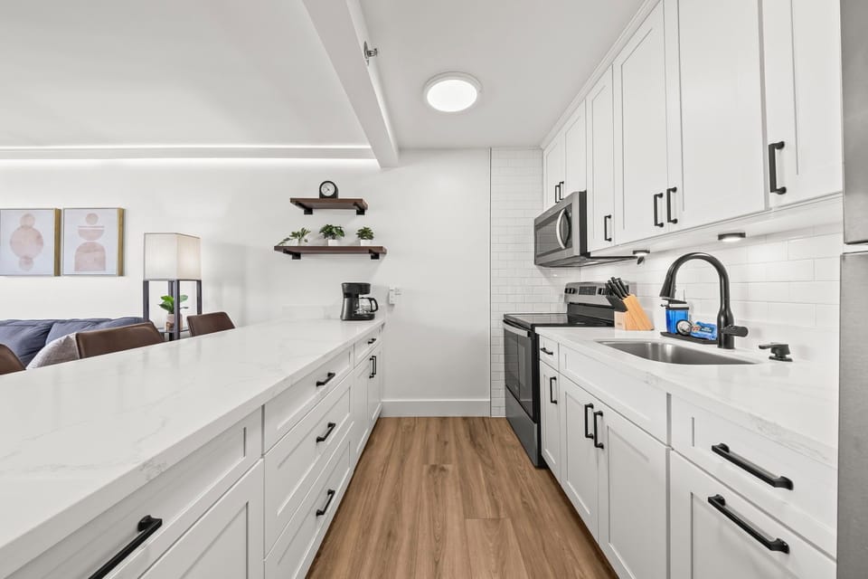 Kitchen essentials: cookware, dishware, utensils, coffee maker, toaster, etc.   