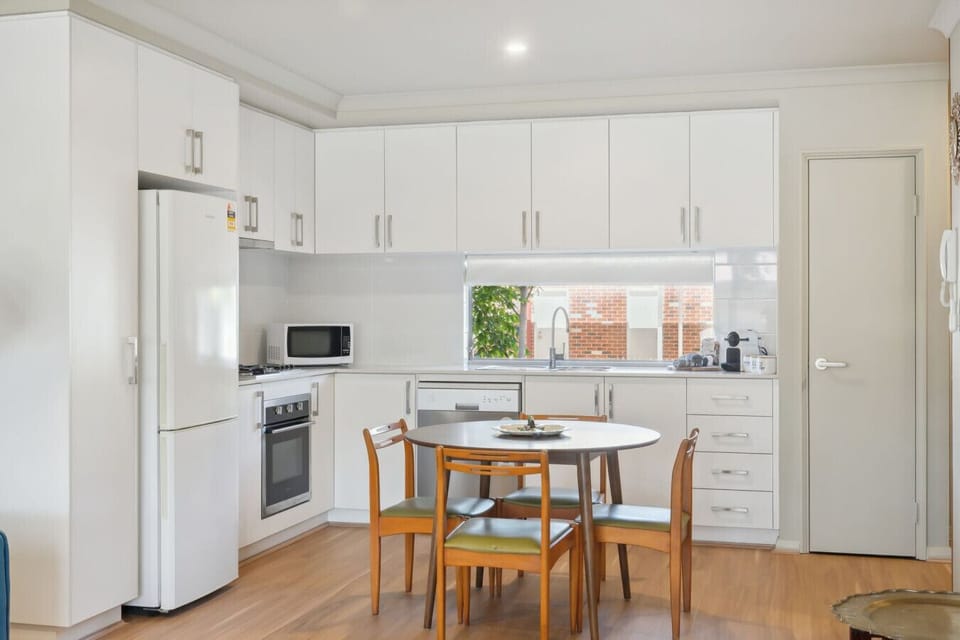 Open-plan kitchen and dining designed for easy meals and relaxed living