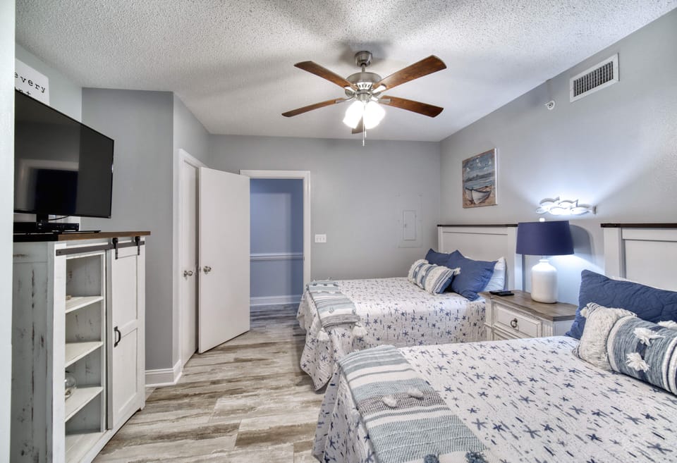 2nd Bedroom. Phoenix X 1112. 2-Bedroom 2-Bathroom. Sleeps 8. Managed by Island Rentals.