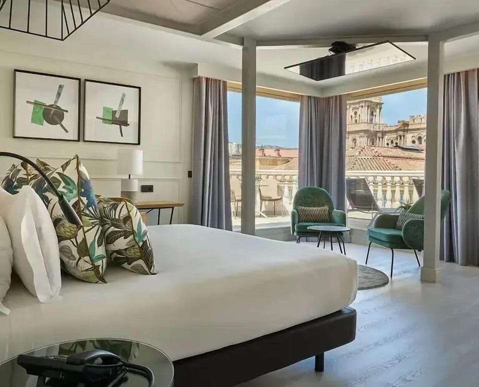 Luxe Essence Larios Views | Premium bedding, down comforters, memory foam beds, minibar