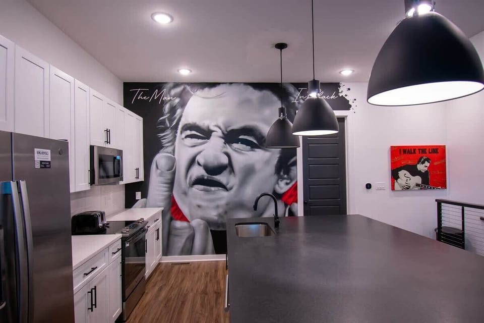 Unique kitchen with a Johnny Cash mural—perfect for memorable photos.