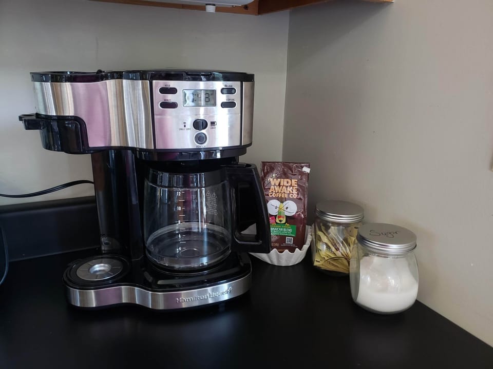 Coffee station - grounds, filters, sweeteners available