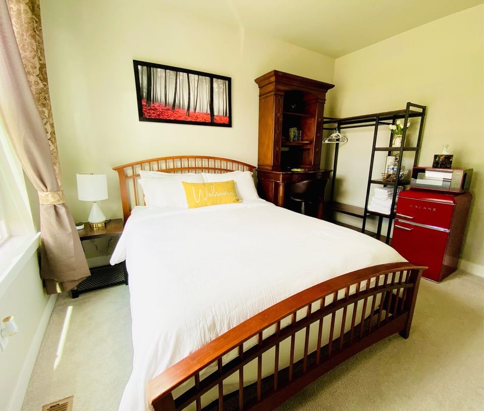 Furnished with a queen-size bed, mini fridge, microwave and K-cup coffee machine