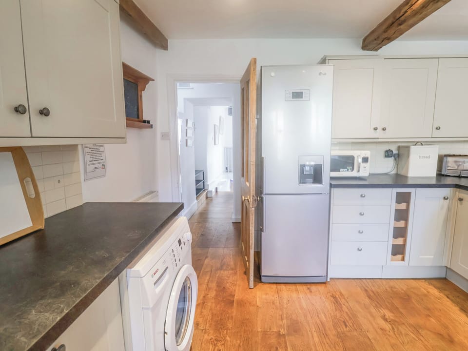 Fridge, microwave, dishwasher, cookware/dishes/utensils