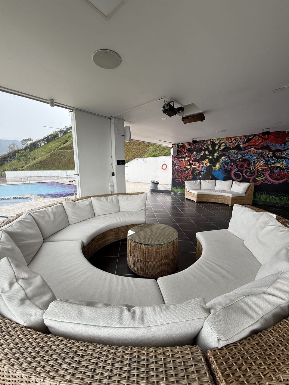 This outdoor lounge / disco has amazing sound  + lazers, and a lighting effect on our handpainted mural that you don't want to miss. TV just to the right here!