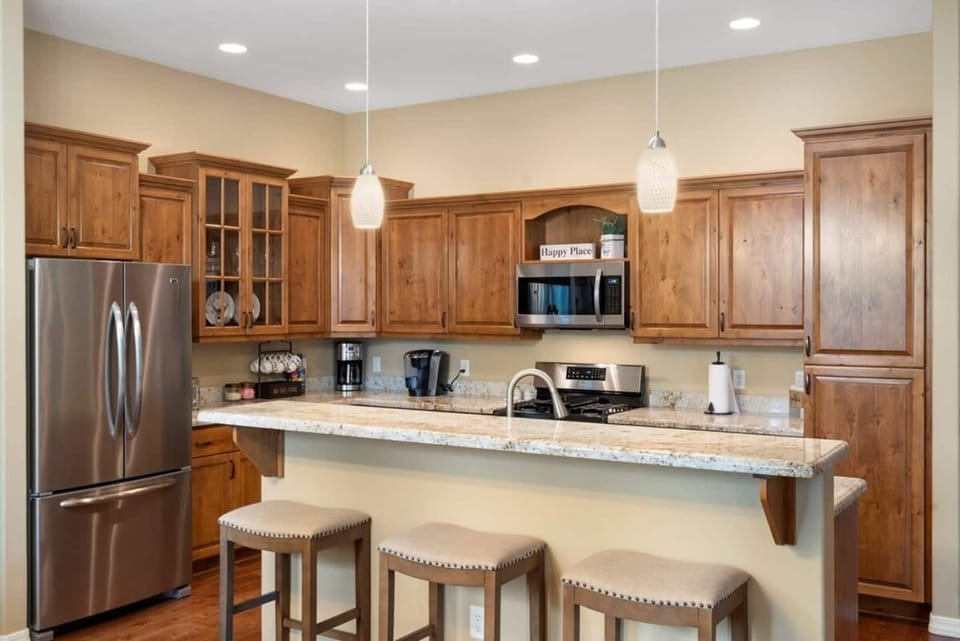 You'll end up parked on one of these stools most mornings, coffee brewing while the rest of the house wakes up slow.