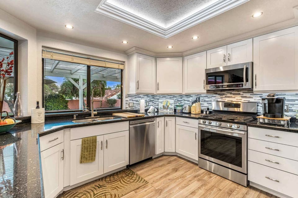  Kitchen with stainless steel appliances