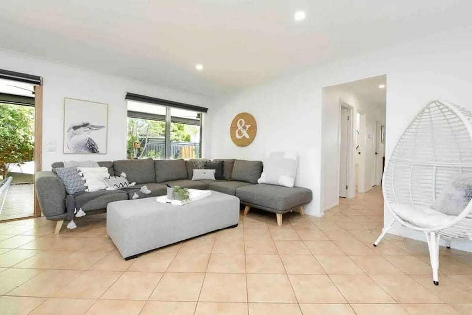 Second living area with couch, dining area