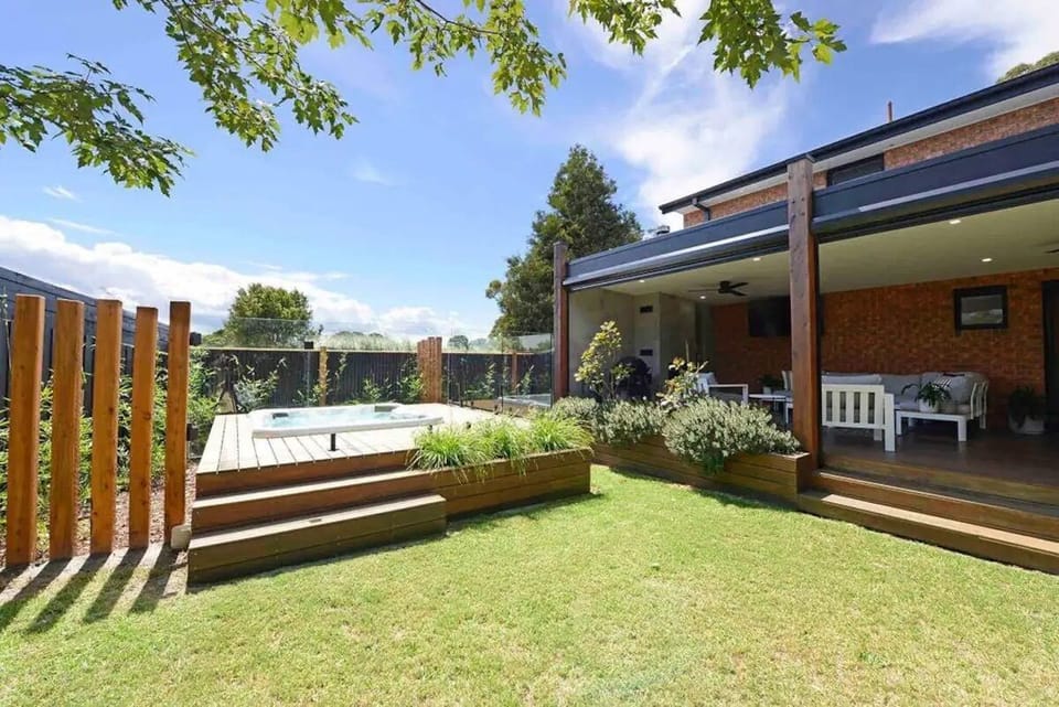 Large secure backyard with spa area