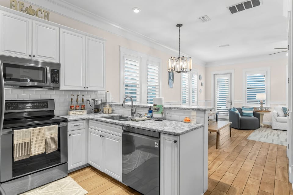 large, updated fully stocked kitchen + coffee bar